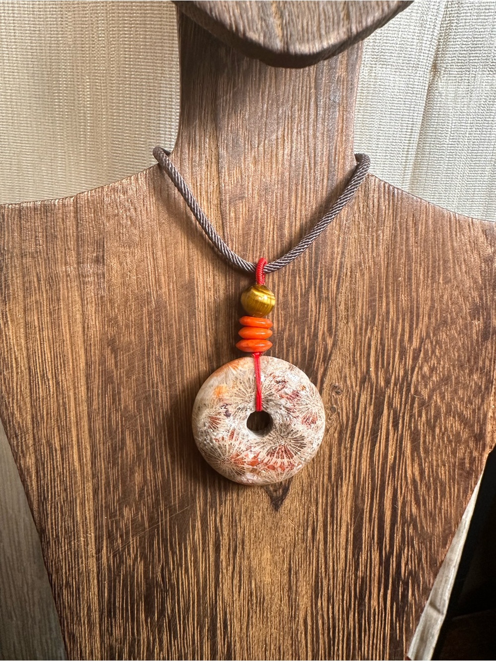 Handcrafted Red and Brown Coral Fossil Donut Pendant Necklace on Brown Rope - Picture 3 of 16